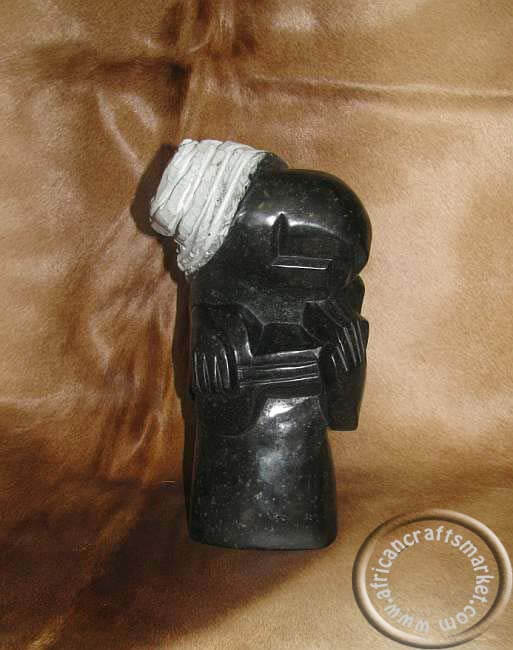 African Abstract Opal Stone Shona guitar player