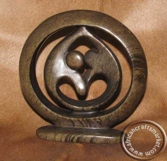 African Hand Carved Abstract Ring Dancers