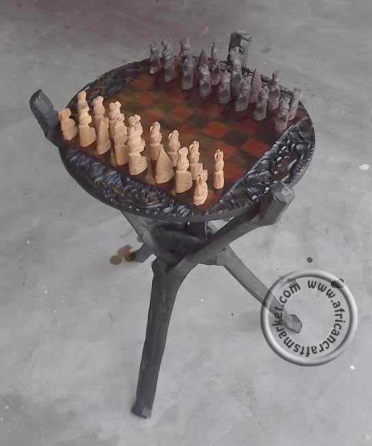 African wooden chess set on table