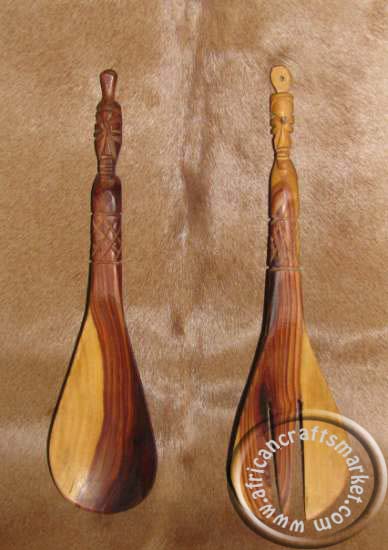 Wood tribal salad servers African tribal salad servers