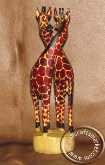 African wooden giraffe couple