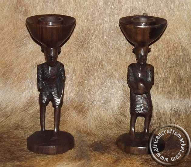 African wooden tribesmen candle holder