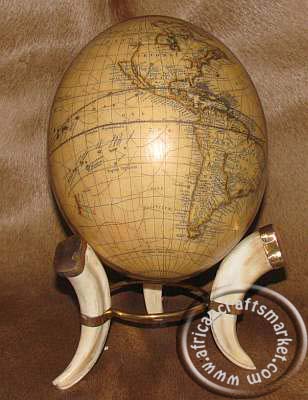 Ostrich egg on Warthog tusk stand