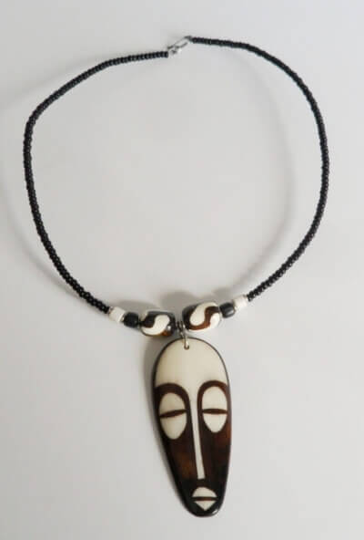 African bone mask necklace