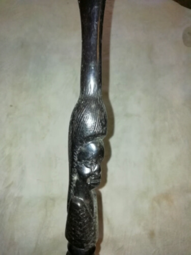 African Ebony woman face cane