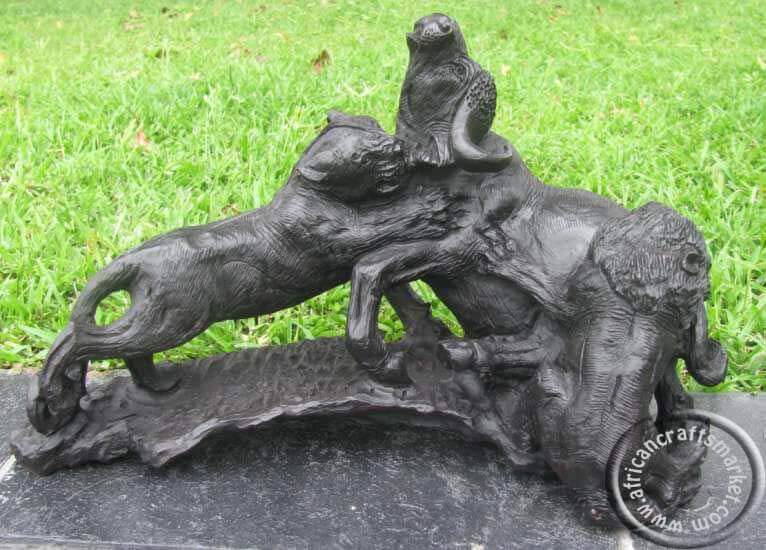 African lions attacking a buffalo
