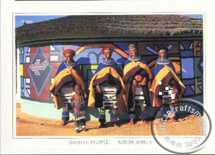 Ndebele woamen outside painted houde