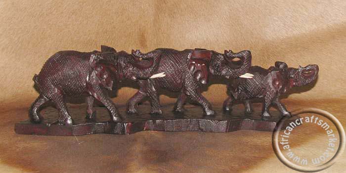 African wooden elephant family