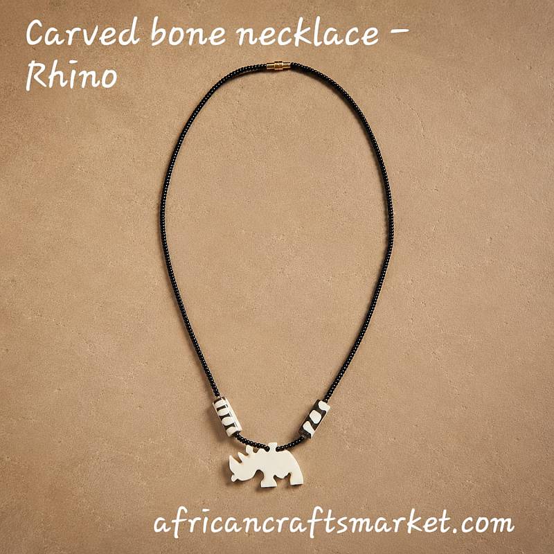 African hand-carved cow bone rhino pendant necklace African hand-carved cow bone rhino pendant necklace