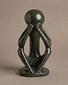 Minimalist Abstract Soapstone Thinker Figurine Minimalist abstract soapstone figurine of a meditating thinker, authentic handmade African cultural art