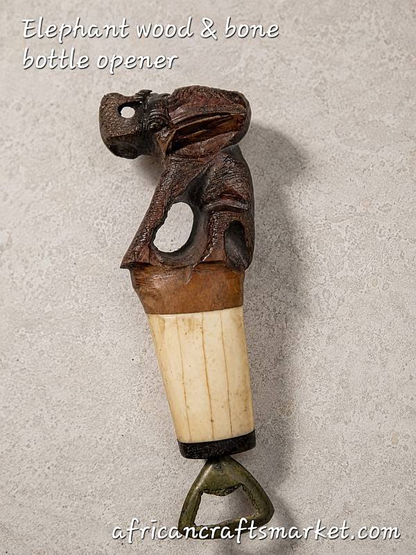 Close-up view of the intricate artisan detailing on a genuine elephant bottle opener, showcasing the flawless connection between the rich dark wood and the smooth cream bone elements