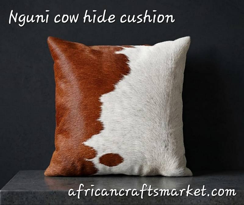Brown and white Nguni cow hide cushion Nguni cow hide cushion - brown and white