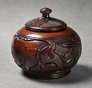 Authentic hand-carved African wooden storage bowl with a matching lid, showcasing polished natural hardwood grain