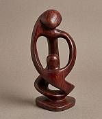 Handcrafted Stone Mother and Child Maternity Statue Handcrafted African stone maternity statue depicting a mother holding her baby, a unique minimalist family sculpture for contemporary home decor