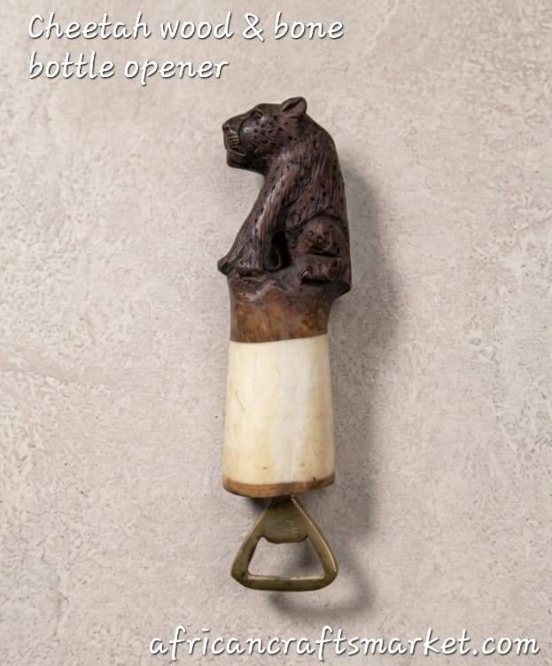 Cheetah bone and wood bottle opener A luxury handcrafted African bottle opener featuring a beautifully carved wooden body and polished animal bone accents seamlessly joined to form a sleek cheetah silhouette, complete with hand-painted spots