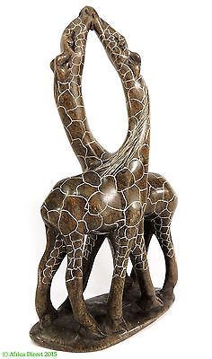 African stone giraffe couple African stone loving giraffes